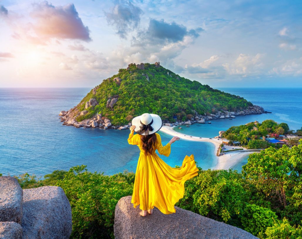 Beautiful girl standing on viewpoint at Koh Nangyuan island near Koh Tao island, Surat Thani in Thailand.